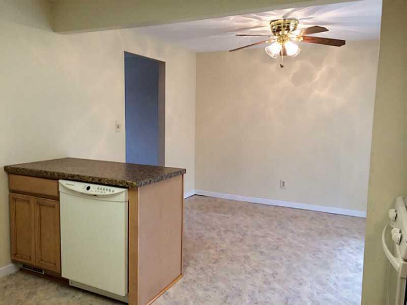 317 Oak Road Plum, PA 15239 - Photo 5 of 13 Dining Room. Dining room off of kitchen with island for extra counter space.