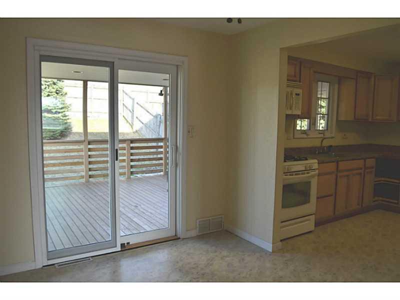317 Oak Road Plum, PA 15239 - Photo 6 of 13 Dining Room. New Pella sliding door that leads to deck