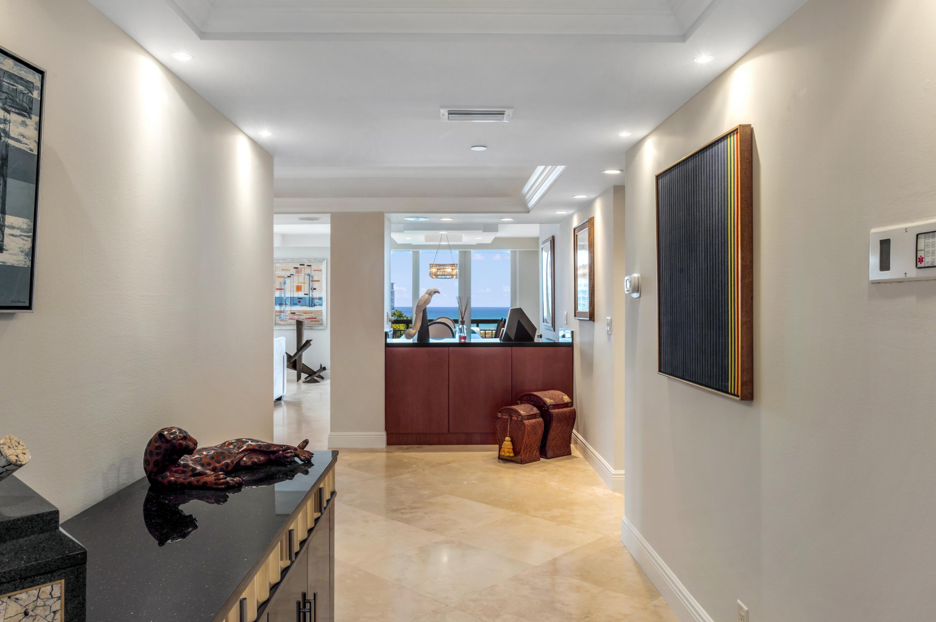 901 East Camino Real, Unit 7C Boca Raton, FL 33432 - Photo 5 of 41 FOYER TO GREAT ROOM