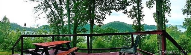 555 Short Ridge Lane Clyde, NC 28721 - Photo 4 of 21 a view of a two chairs in the balcony