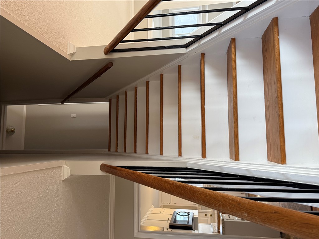 325 Circle Drive Pendleton, SC 29670 - Photo 15 of 21 Ascend or descend with grace on these finely crafted stairs, offering a glimpse of the inviting living spaces below.