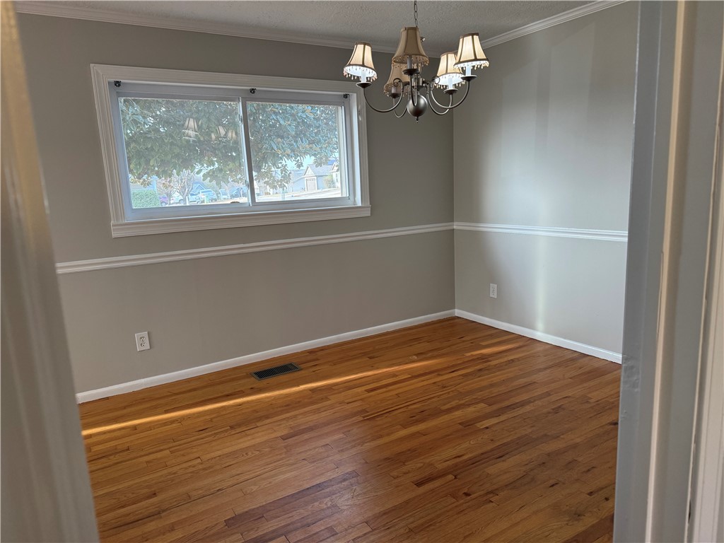325 Circle Drive Pendleton, SC 29670 - Photo 9 of 21 This bright space features natural light and hardwood floors, ready for your personal touch.