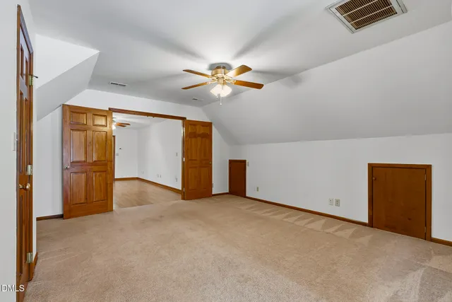 a bathroom with a sink a vanity and a mirror