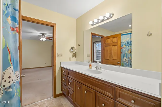 a view of an empty room with glass door