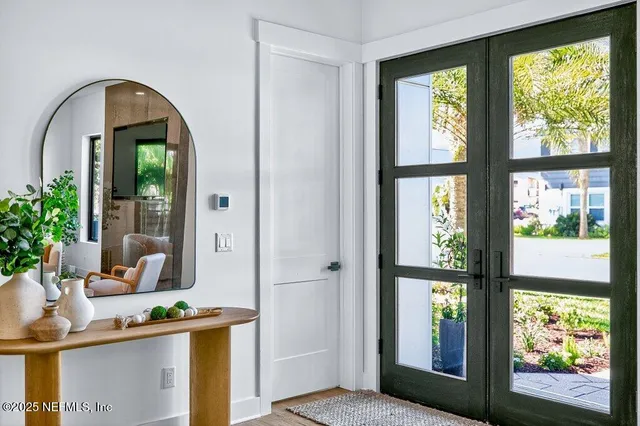 a kitchen with a sink and a stove top oven