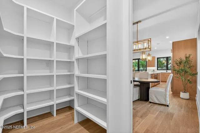 a view of a backyard with sitting area