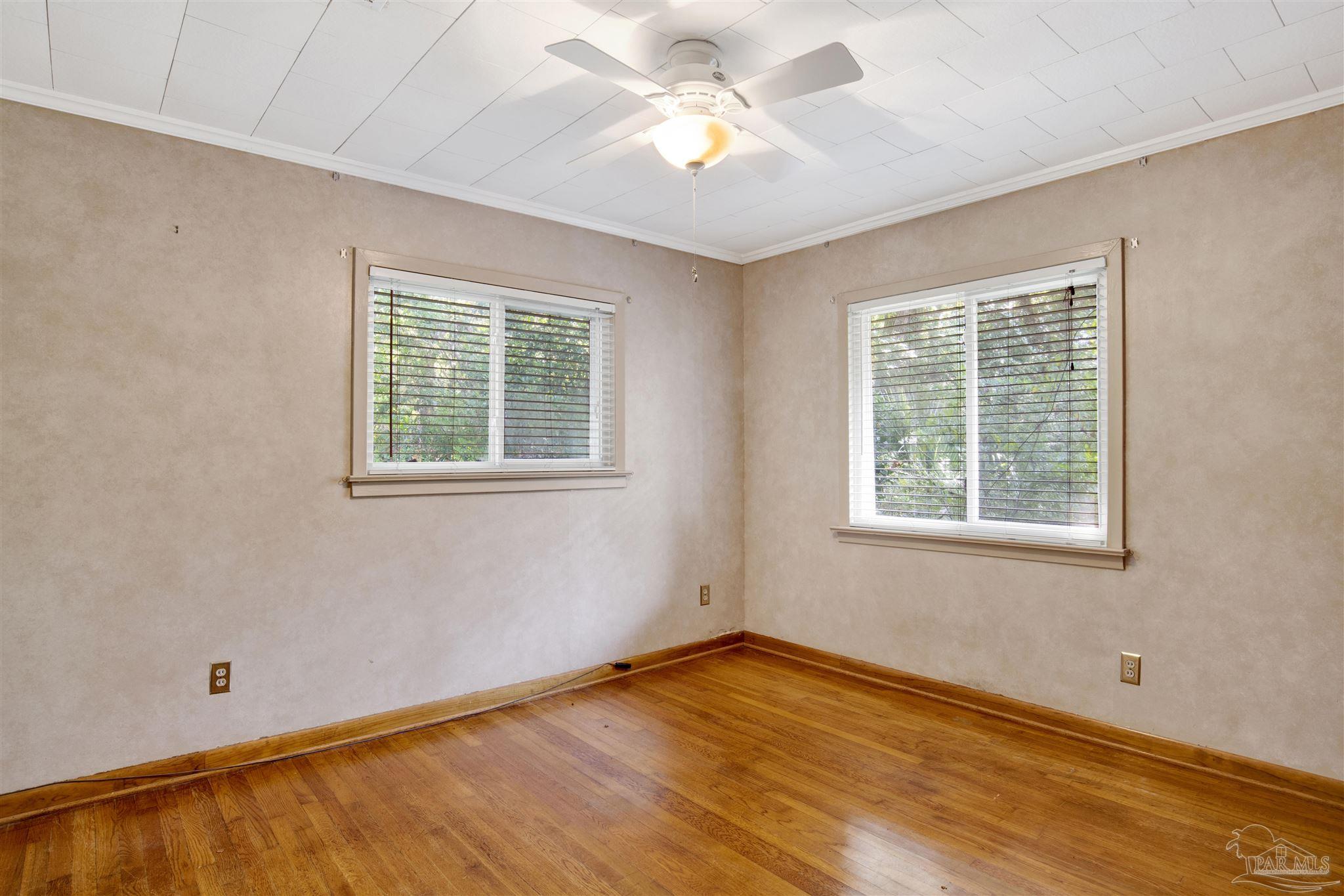533 Ditmar Street Pensacola, FL 32503 - Photo 26 of 37 a view of an empty room with a window and closet area