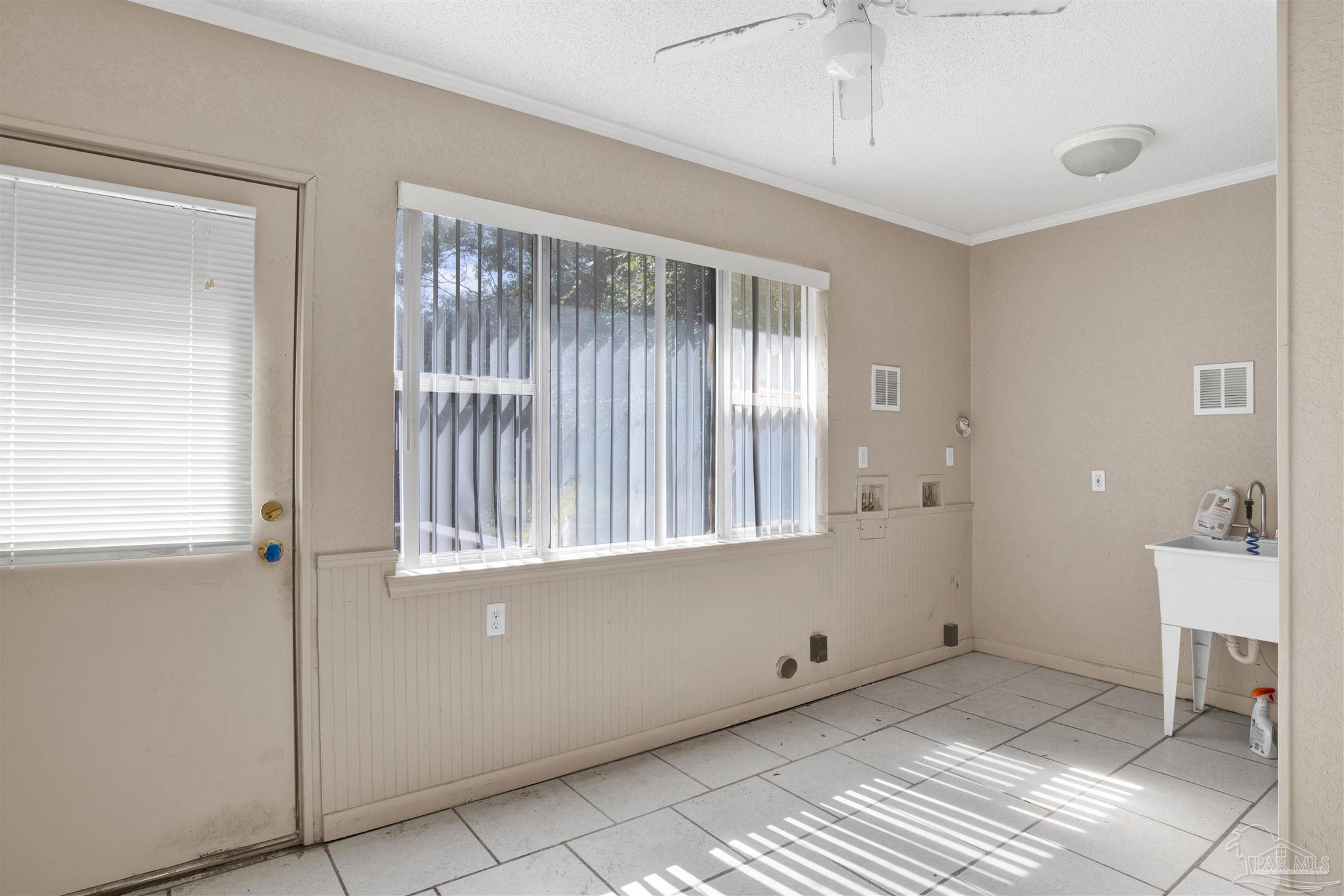 533 Ditmar Street Pensacola, FL 32503 - Photo 27 of 37 a view of an empty room with a window