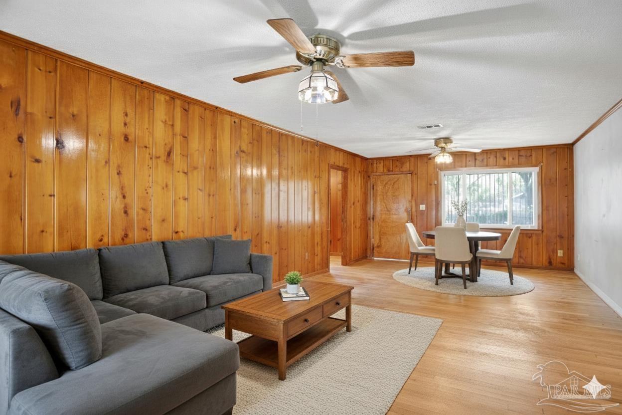 533 Ditmar Street Pensacola, FL 32503 - Photo 4 of 37 a living room with furniture and a large window
