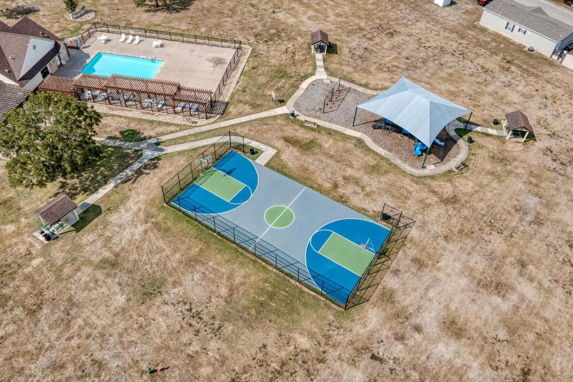 187 Horseshoe Bend Road San Marcos, TX 78666 - Photo 38 of 38 Drone / aerial view of a pool