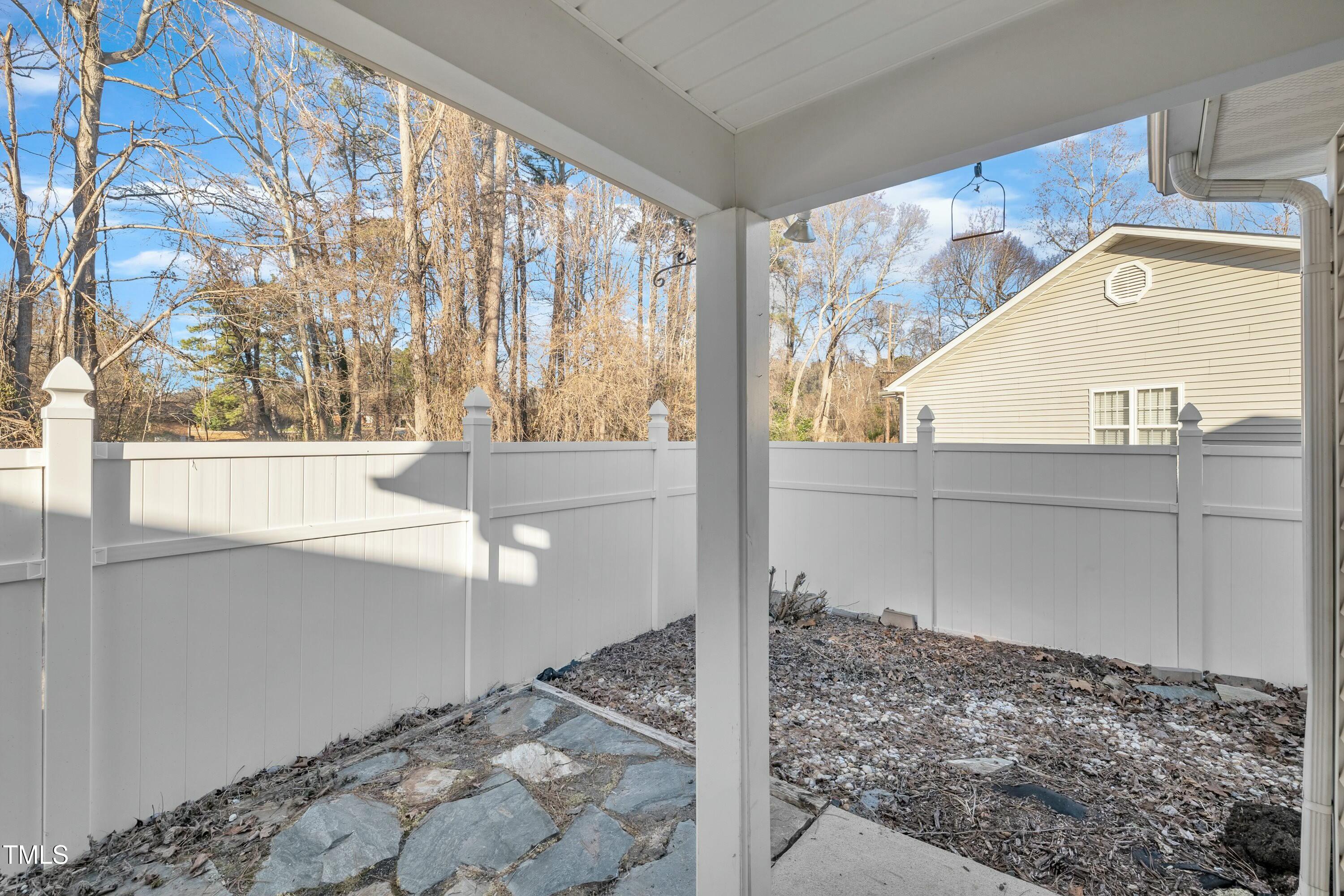 3727 Votive Lane Raleigh, NC 27604 - Photo 26 of 28 Backyard! Fenced in and covered patio area!