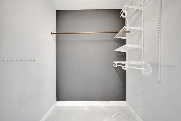 a view of an empty room and window