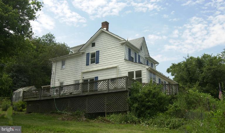 2315 Gillis Road Mount Airy, MD 21771 - Photo 22 of 30 a view of a house with roof deck and backyard