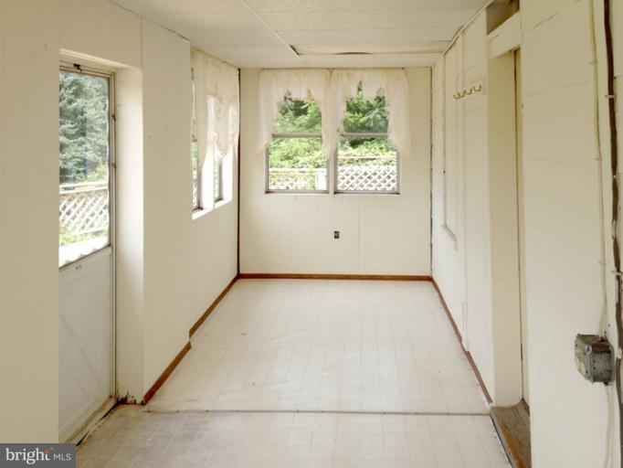 2315 Gillis Road Mount Airy, MD 21771 - Photo 4 of 30 a view of a hallway with a window