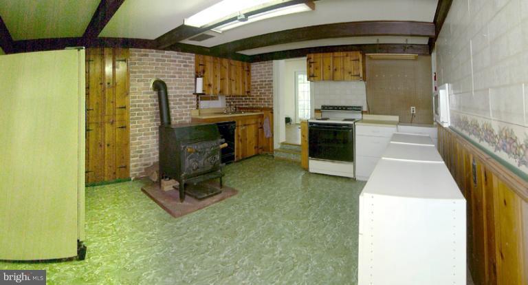 2315 Gillis Road Mount Airy, MD 21771 - Photo 6 of 30 a kitchen with refrigerator and window