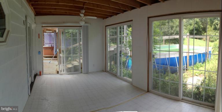 2315 Gillis Road Mount Airy, MD 21771 - Photo 8 of 30 a view of a room with large windows and floor to ceiling window