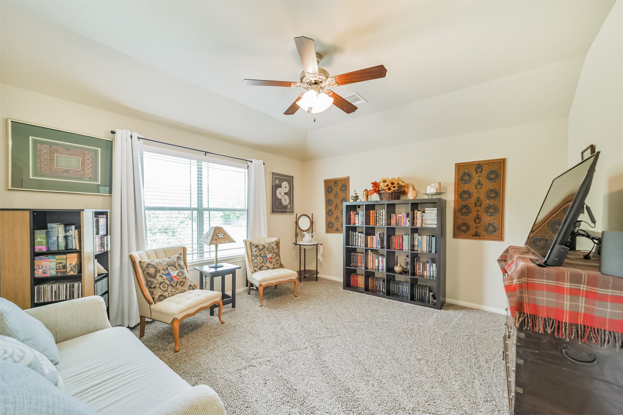 12009 La Salle River Road Conroe, TX 77304 - Photo 23 of 50 a living room with furniture stairs and a large window