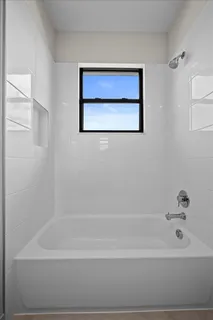 a bathroom with a bathtub