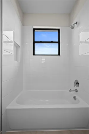 a bathroom with a bathtub