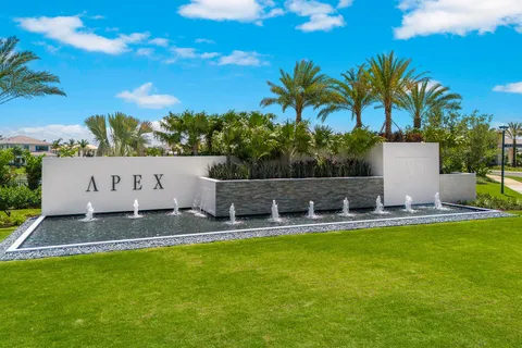 a swimming pool with outdoor seating and yard