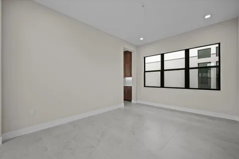 an empty room with windows