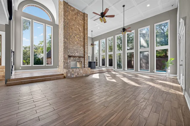 a view of an entryway with wooden floor