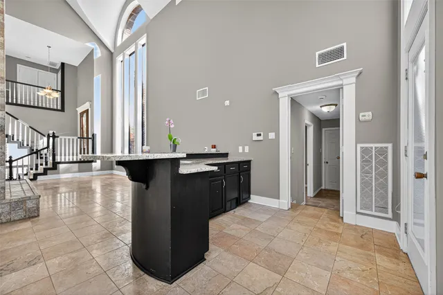 a view of a kitchen cabinets and a counter place