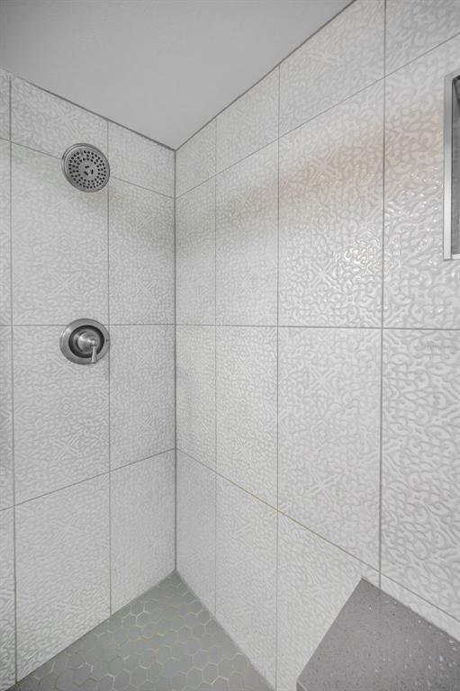 203 Tarpon Point, Unit 203 Tarpon Springs, FL 34689 - Photo 25 of 39 a bathroom with a shower