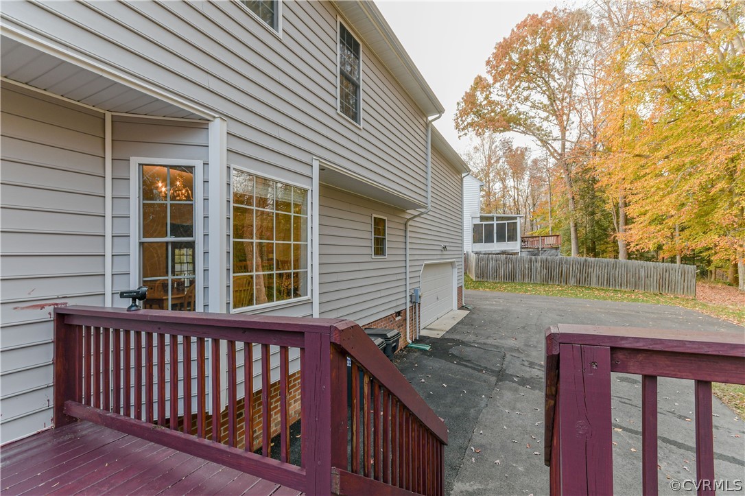 3833 Dunraven Road Chesterfield, VA 23236 - Photo 30 of 39 a view of a house with a wooden fence