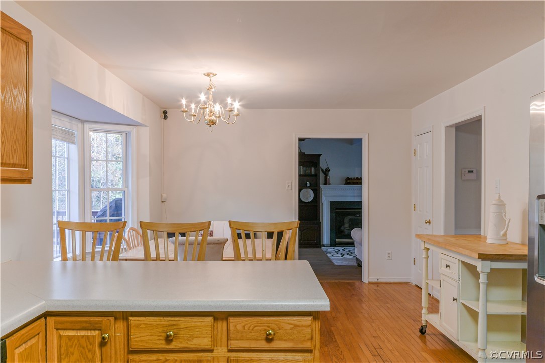 3833 Dunraven Road Chesterfield, VA 23236 - Photo 7 of 39 a view of a living room with furniture and a chandelier