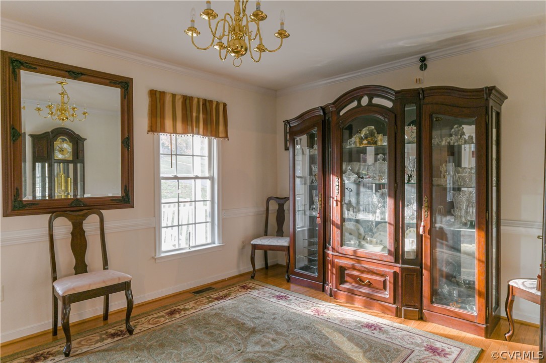 3833 Dunraven Road Chesterfield, VA 23236 - Photo 9 of 39 a living room with furniture and a window