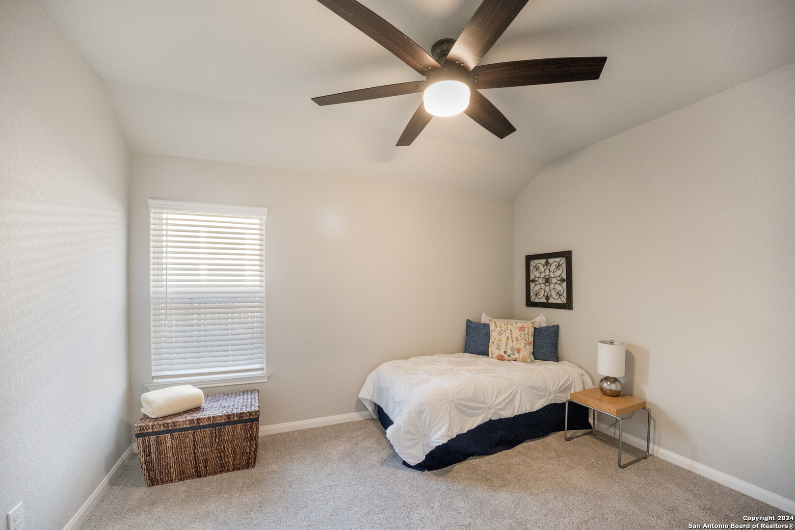 3110 Blenheim Park Bulverde, TX 78163 - Photo 17 of 20 a bedroom with a bed and a window