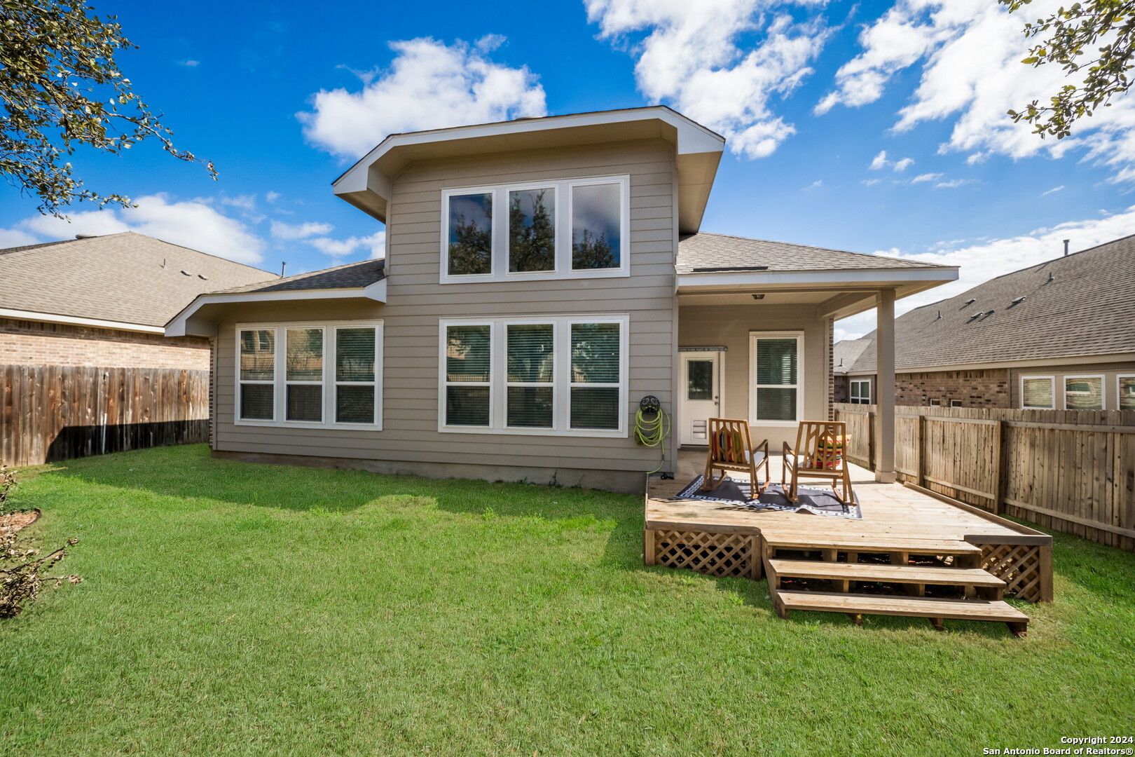 3110 Blenheim Park Bulverde, TX 78163 - Photo 20 of 20 a front view of a house with a yard table and chairs