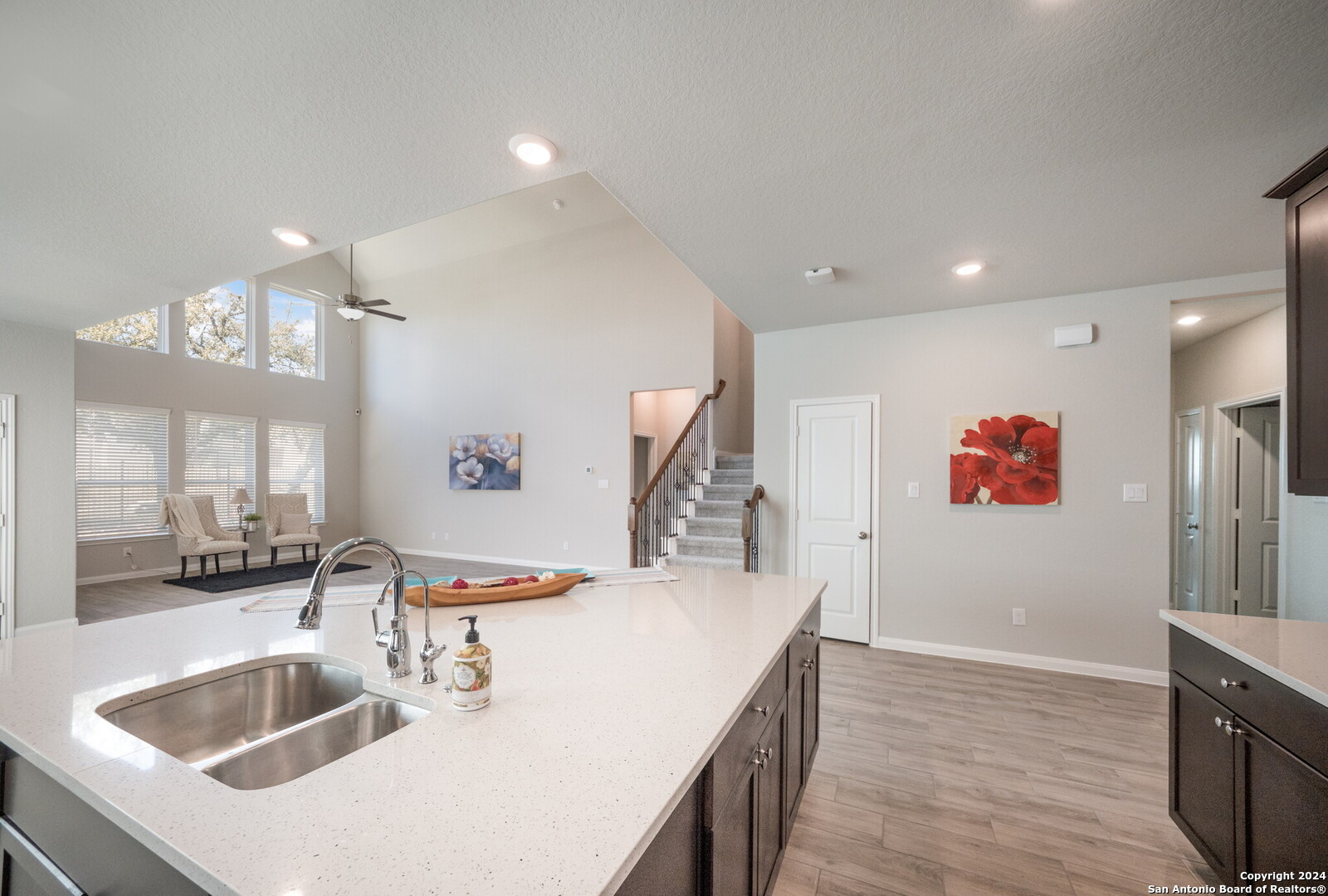 3110 Blenheim Park Bulverde, TX 78163 - Photo 6 of 20 a kitchen with kitchen island a sink appliances and a counter top space