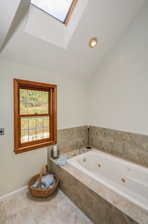 88 Providence Road Westford, MA 01886 - Photo 20 of 29 a bathroom with a tub and a sink