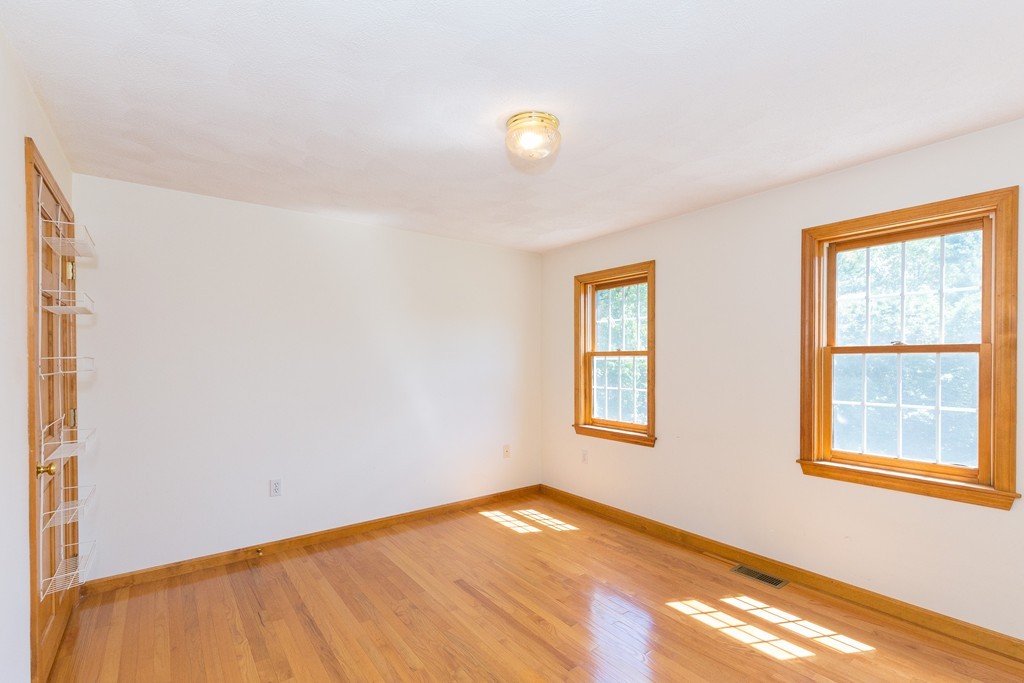 88 Providence Road Westford, MA 01886 - Photo 22 of 29 a view of an empty room with a window