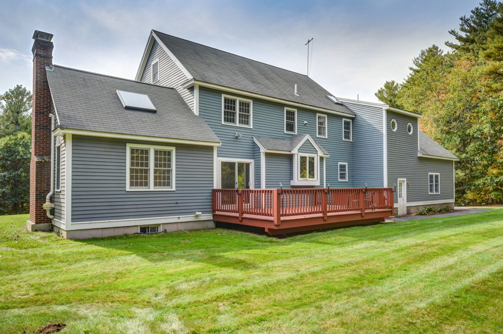 88 Providence Road Westford, MA 01886 - Photo 29 of 29 a front view of a house with a garden