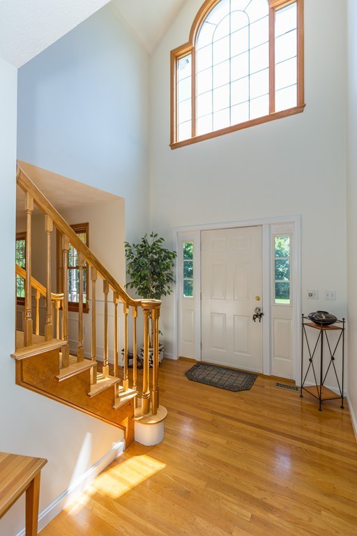 88 Providence Road Westford, MA 01886 - Photo 4 of 29 a view of a livingroom with wooden floor and a furniture