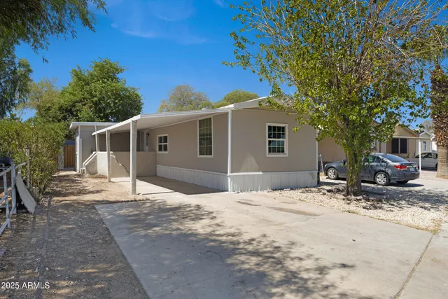a house with trees in the background