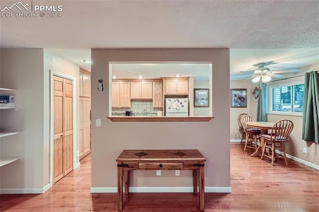 a view of a livingroom with furniture and wooden floor