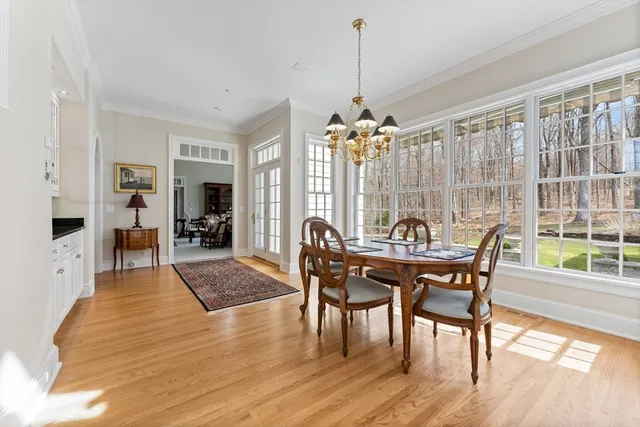 a view of an empty room with windows