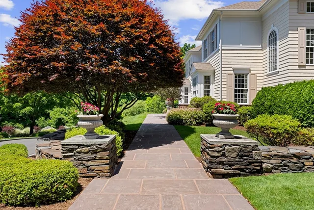 a view of a house with a garden