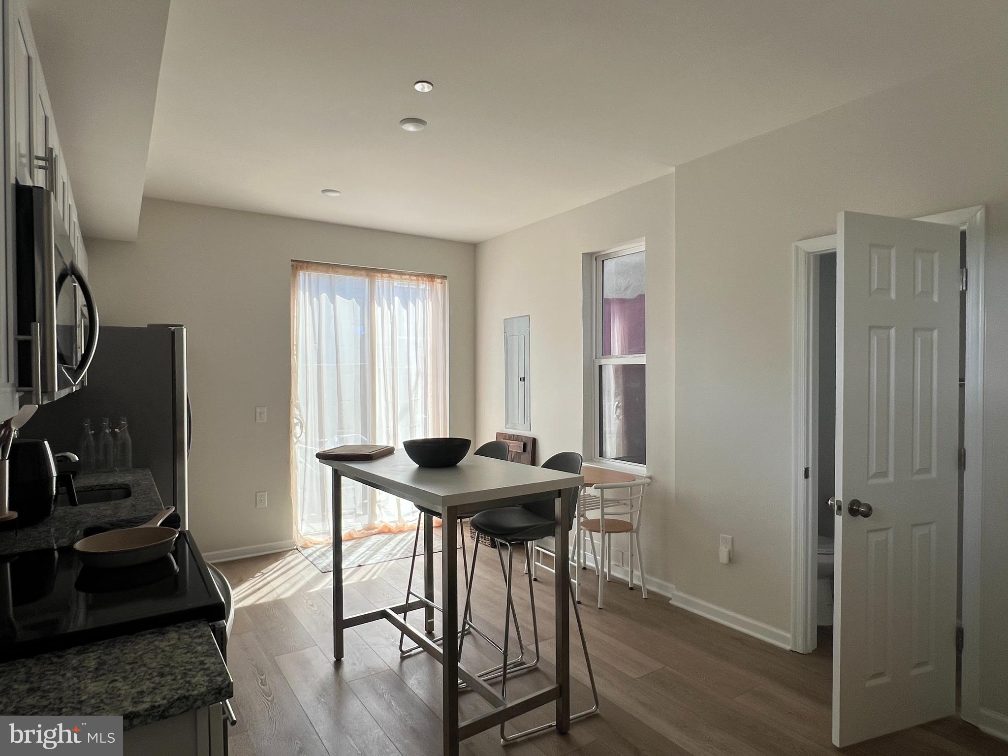 2700 Sears Street Philadelphia, PA 19146 - Photo 6 of 10 a view of a workspace with furniture and a window