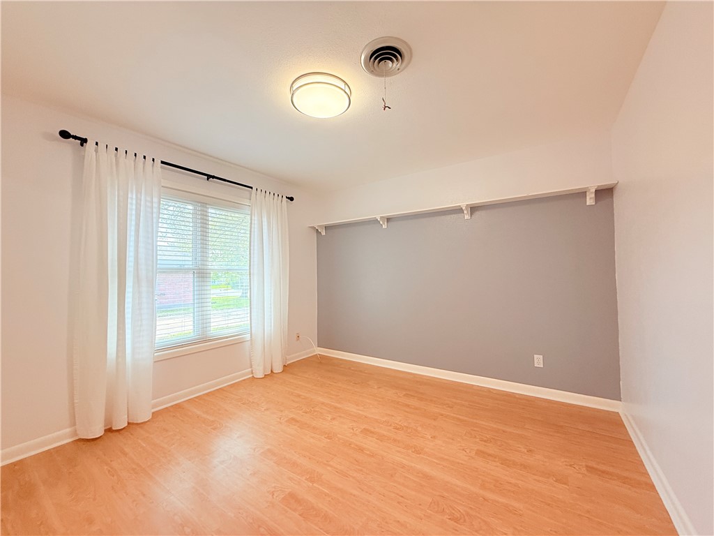 126 Marie Place Portland, TX 78374 - Photo 16 of 40 a view of an empty room with a window
