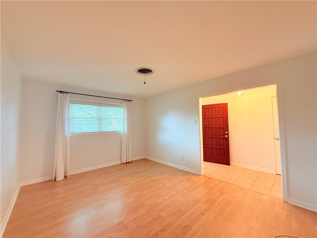 126 Marie Place Portland, TX 78374 - Photo 2 of 40 an empty room with window
