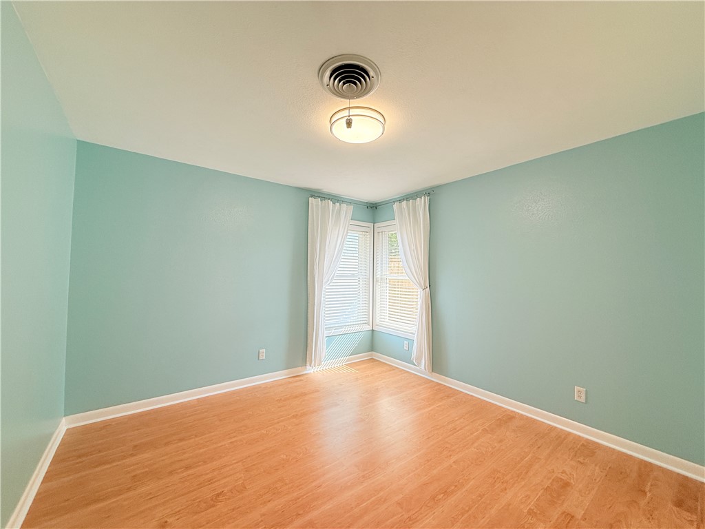 126 Marie Place Portland, TX 78374 - Photo 24 of 40 a view of a room with wooden floor and bathroom