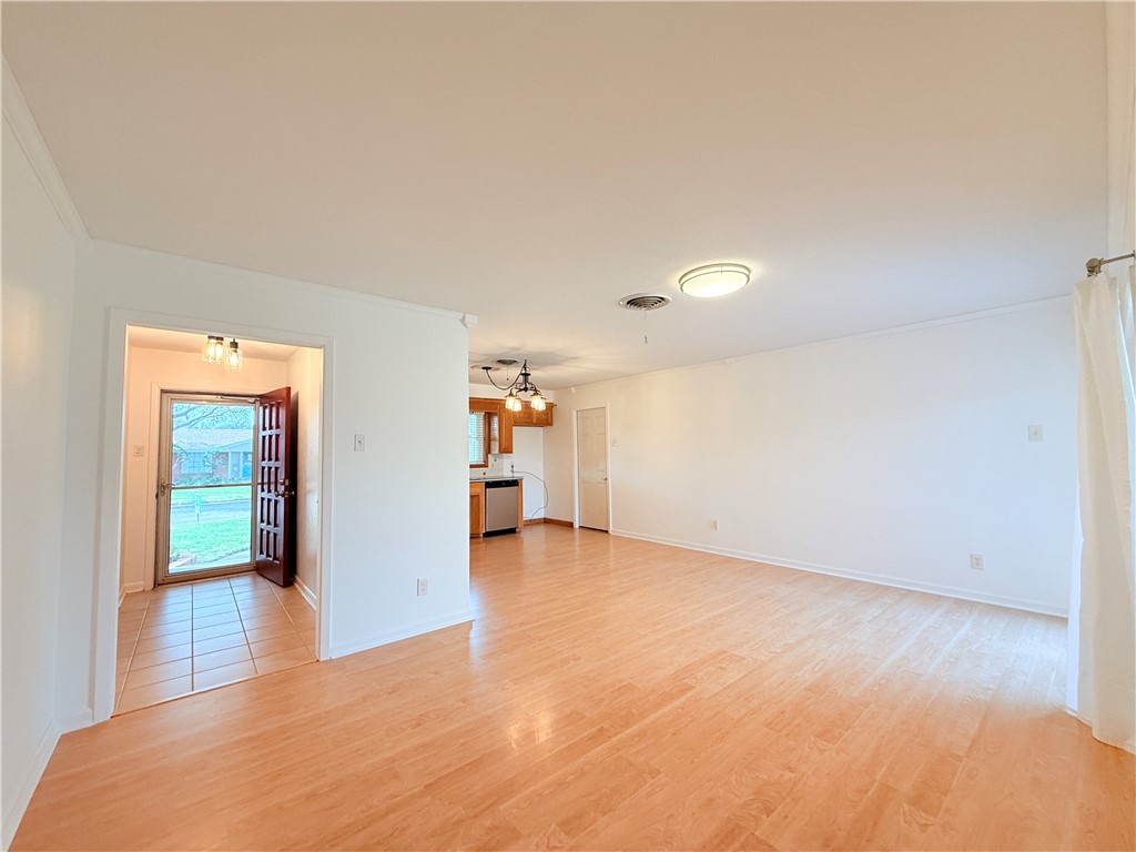 126 Marie Place Portland, TX 78374 - Photo 6 of 40 a view of empty room with wooden floor