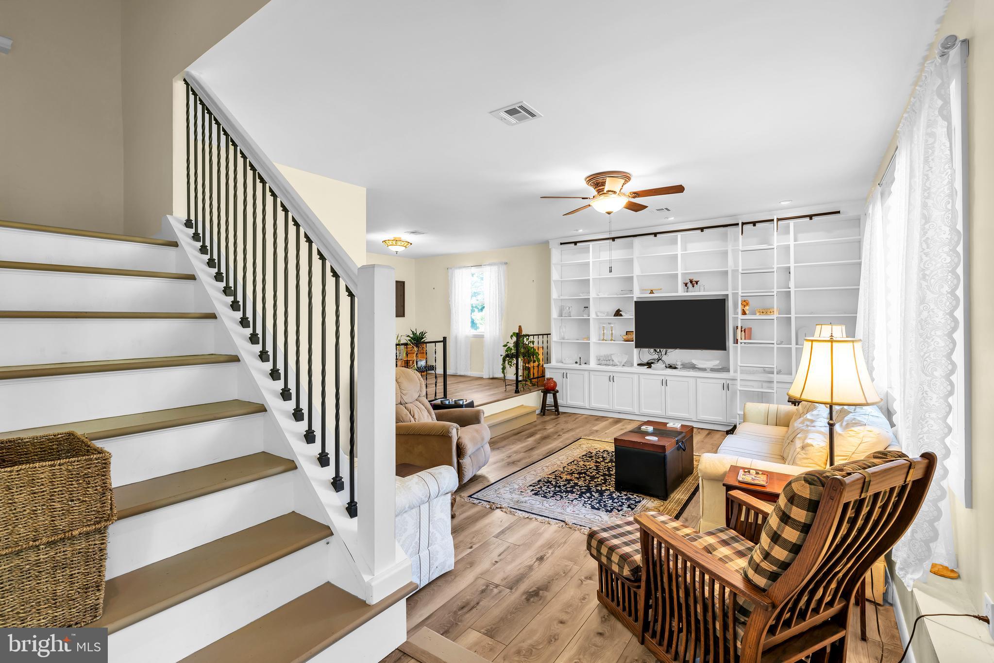 70 MacKenzie Road Hampton, NJ 08827 - Photo 19 of 45 a living room with furniture and a flat screen tv