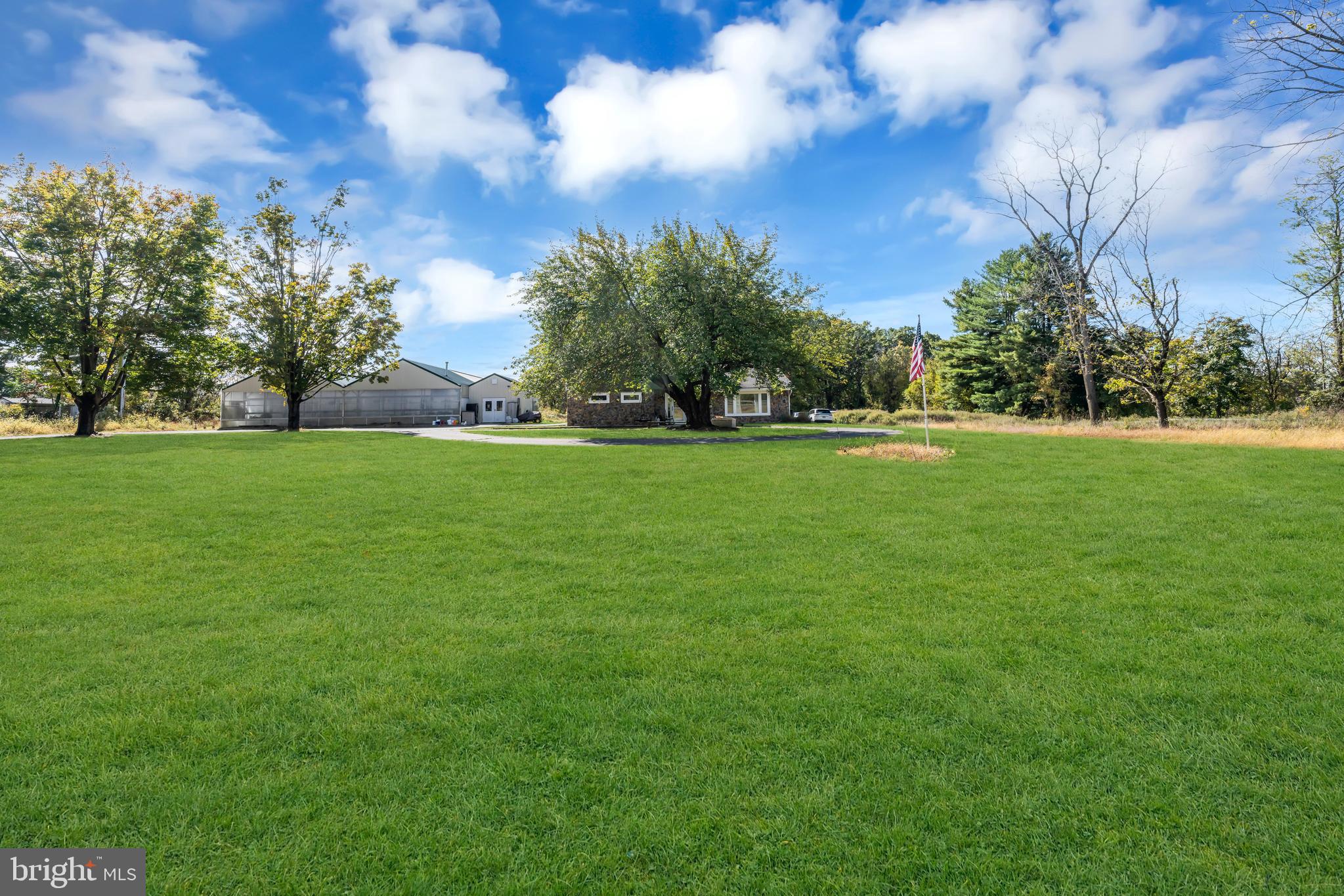 70 MacKenzie Road Hampton, NJ 08827 - Photo 2 of 45 a view of a trees in a field of grass and trees