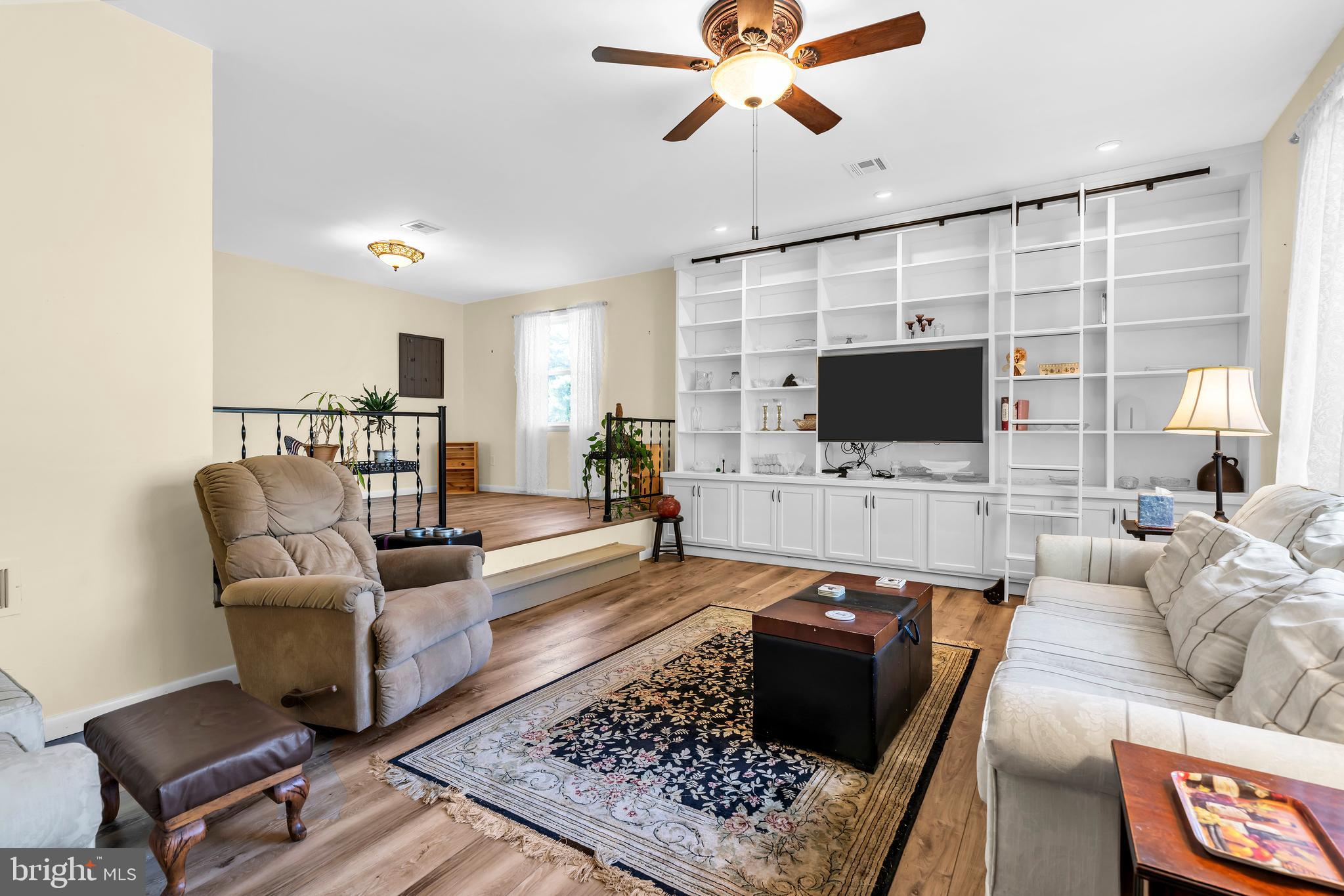 70 MacKenzie Road Hampton, NJ 08827 - Photo 22 of 45 a living room with furniture and a flat screen tv